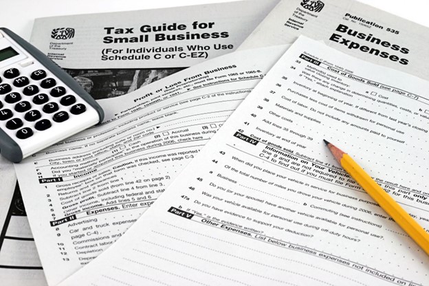 Several pages of tax forms for small businesses prepping for tax season.