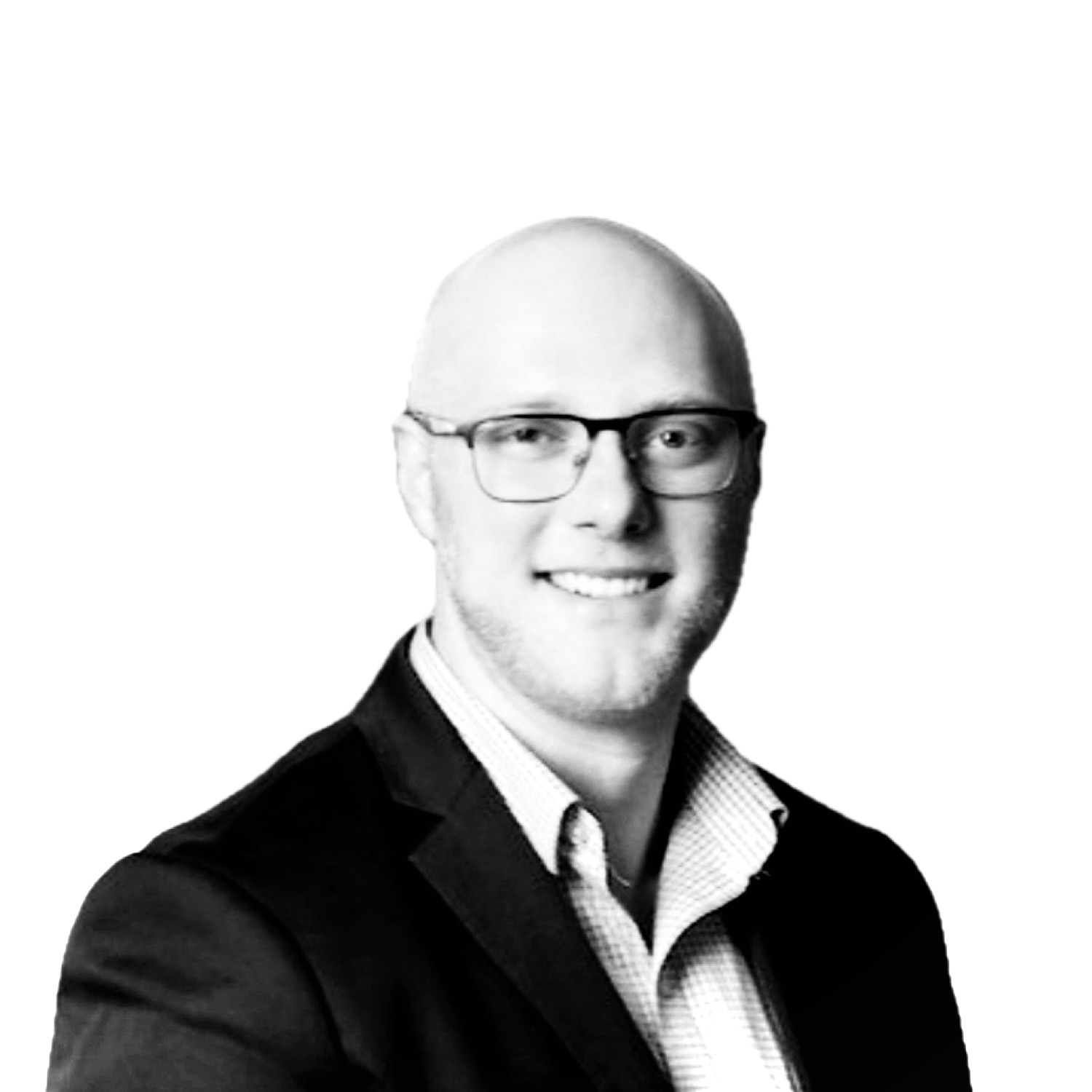 Head-and-shoulders portrait of a smiling bald man wearing glasses, a dark blazer, and a light shirt grid pattern, facing slightly to the right.