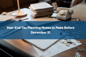 Screenshot 2026-10-09 151201 - Evans Sternau CPA - Evans Sternau CPA Desk scene with papers, a telephone, and coins; a blue banner bearing the title 'Year-End Tax Planning Moves to Make Before December 31'.